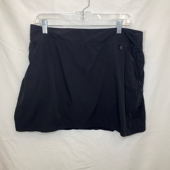 Black Calvin Klein work out skirt. Has built in shorts underneath. - Picture 2 of 2